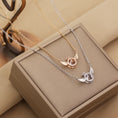 Load image into Gallery viewer, The Heart-Beating Clavicle Chain with Smart Angel Wings Is a Stylish, Light Luxury, Niche Design and Temperament Gift
